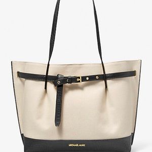 MK linen tote w/black patent leather straps and 1small tear on edge.Pic shown.